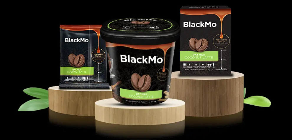 BlackMo’s Coconut Latte tub, box and sachet packaging in full display on wooden platforms.