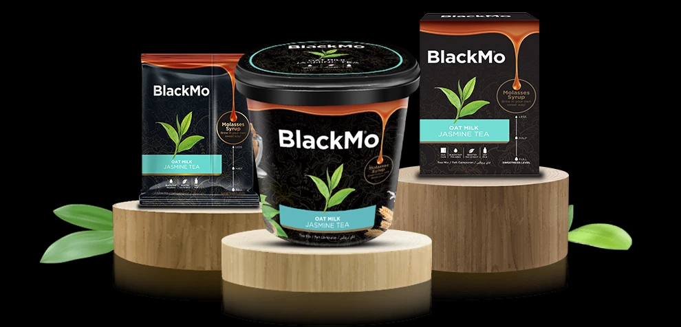 BlackMo’s Jasmine Tea tub, box and sachet packaging in full display on wooden platforms.