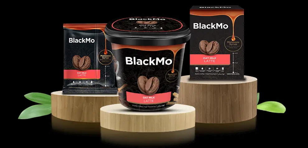 BlackMo’s Latte tub, box and sachet packaging in full display on wooden platforms.