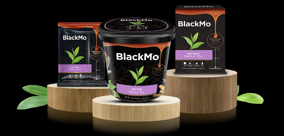 BlackMo’s Maple Tea tub, box and sachet packaging in full display on wooden platforms.